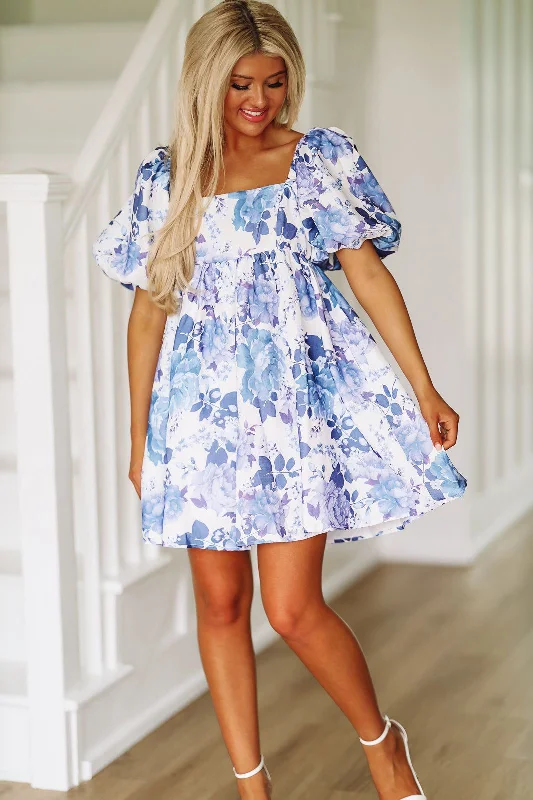 Midi dresses with embroidered accents for a unique and detailed design In the Air Floral Mini Dress - Blue and White Midi dresses with embroidered accents for a unique and detailed design In the Air Floral Mini Dress - Blue and White