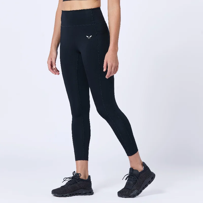 Women's High - Waisted Tight Trousers with Side Slits in Beige for a Trendy LookEssential ACT Leggings 24" 2.0 - Black Women's High - Waisted Tight Trousers with Side Slits in Beige for a Trendy LookEssential ACT Leggings 24" 2.0 - Black