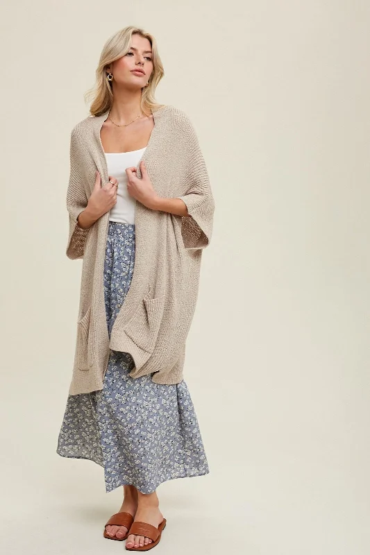 oversized women cardigan for a trendy and cozy lookCream Drop Shoulder Side Pocket 3/4 Sleeve Cardigan oversized women cardigan for a trendy and cozy lookCream Drop Shoulder Side Pocket 3/4 Sleeve Cardigan