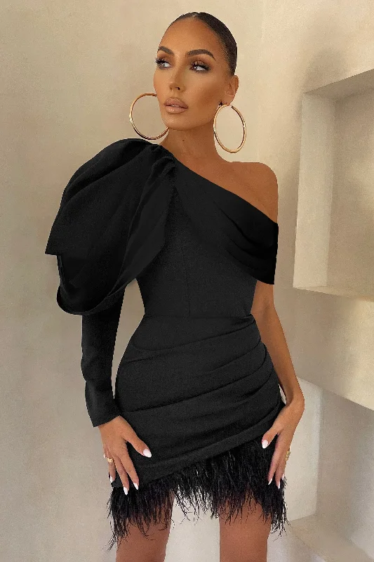 Backless Women Dress for a Sexy and Alluring Look at Evening EventsRSVP | Black Asymmetric Volume Sleeve Draped Feather Mini Dress Backless Women Dress for a Sexy and Alluring Look at Evening EventsRSVP | Black Asymmetric Volume Sleeve Draped Feather Mini Dress