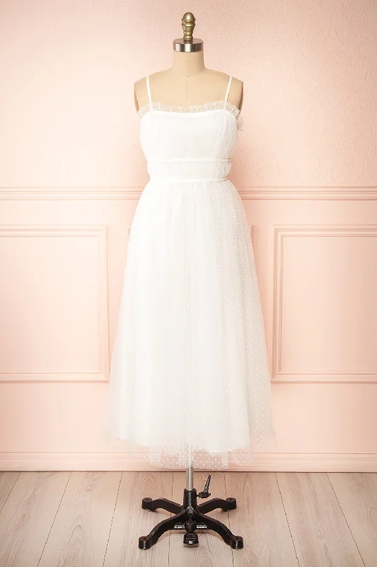 Midi dresses with geometric cutouts for a contemporary and edgy lookLalatiana | White Tulle Midi Dress w/ Polka Dots Midi dresses with geometric cutouts for a contemporary and edgy lookLalatiana | White Tulle Midi Dress w/ Polka Dots