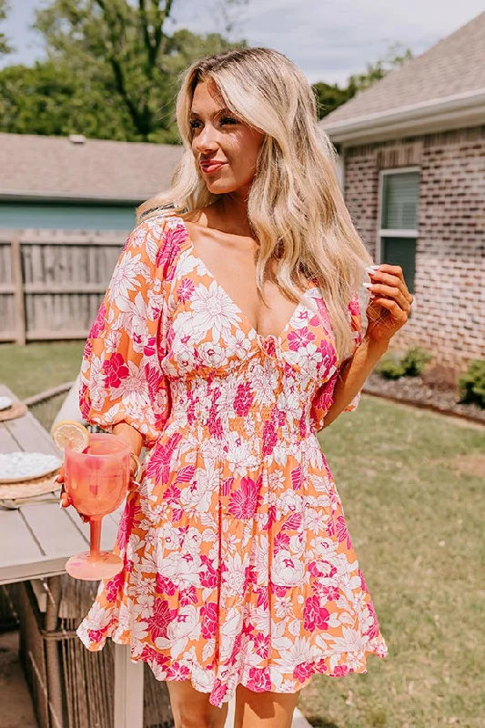 Mini dresses with pleated skirts for a classic lookWhispering Muse Floral Mini Dress in Orange Mini dresses with pleated skirts for a classic lookWhispering Muse Floral Mini Dress in Orange