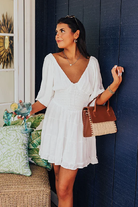 Mini dresses with abstract prints for an artistic lookWhispering Muse Smocked Mini Dress In White Mini dresses with abstract prints for an artistic lookWhispering Muse Smocked Mini Dress In White