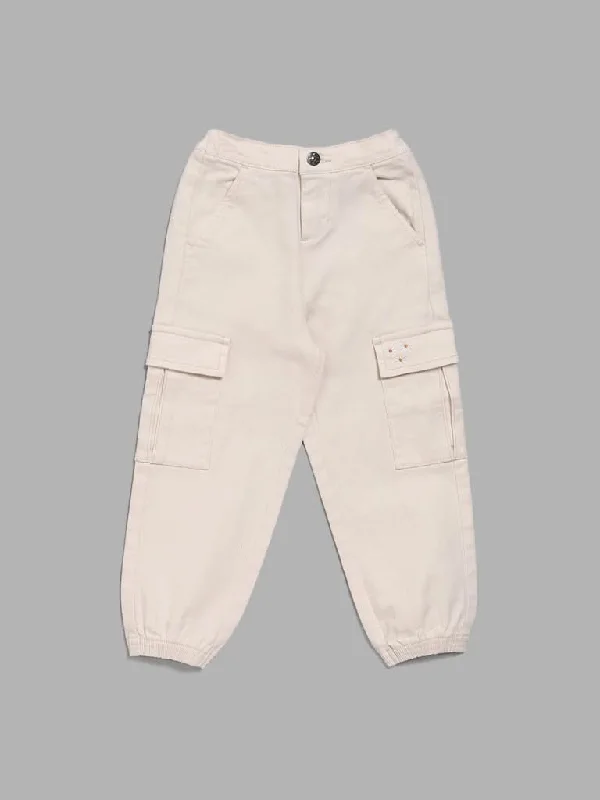 Denim Women Shorts with Distressed Details for a Casual VibeHOP Kids Beige Floral Embroidered Cargo Joggers Denim Women Shorts with Distressed Details for a Casual VibeHOP Kids Beige Floral Embroidered Cargo Joggers